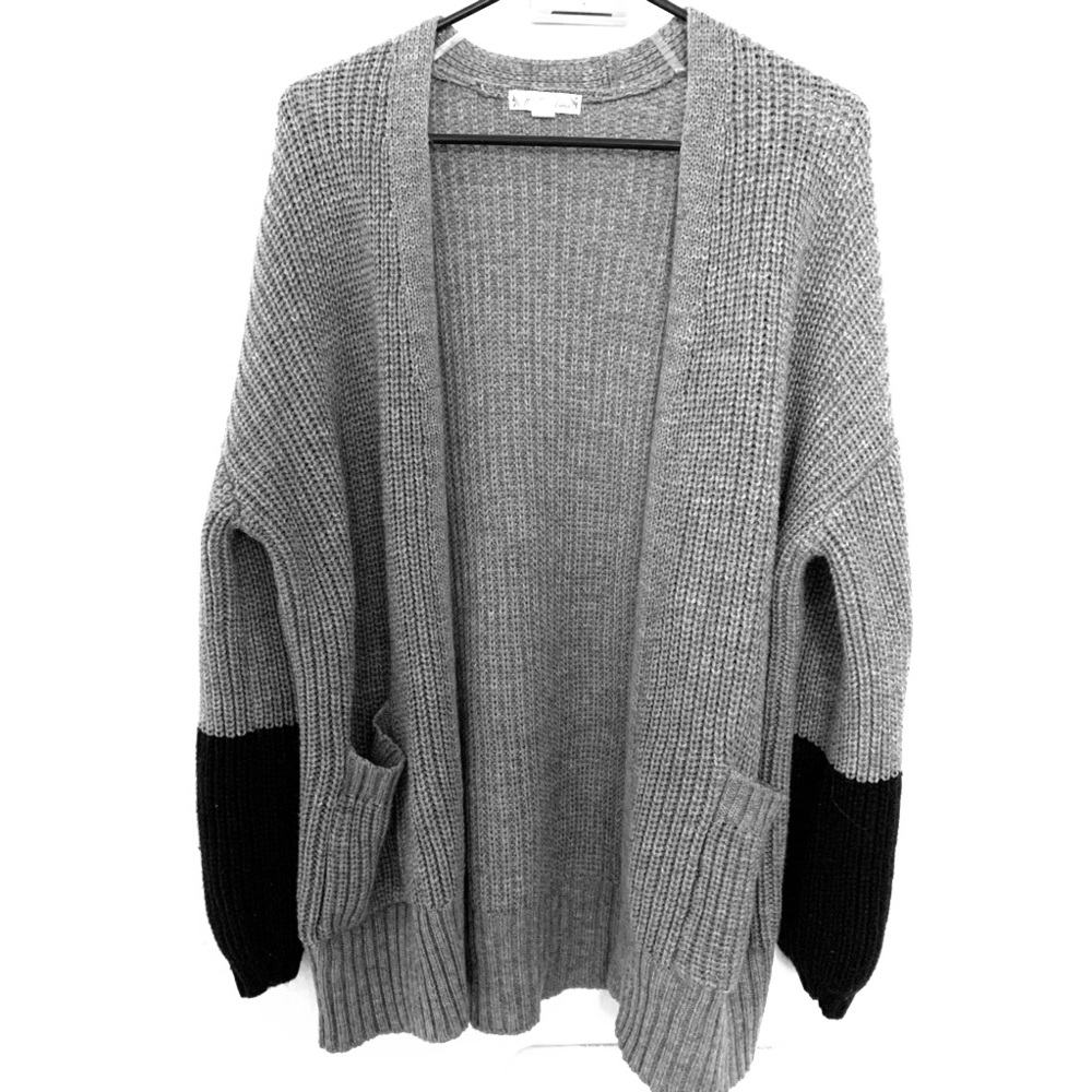 Grey cardigan.